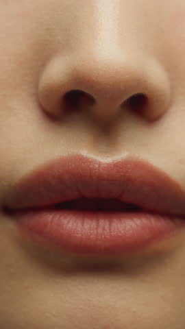 Closeup woman open mouth female plump lips natural beauty Asian girl unrecognizable Korean lady model face skin lip balm lipstick filler surgery injection procedure cosmetics teeth health cute smiling