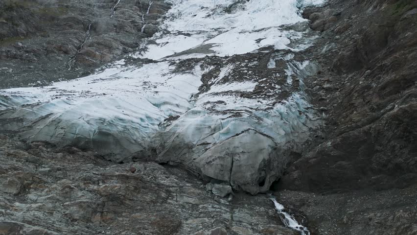 Pan across the Bossons Glacier in the French Alps near Chamonix in the Mont Blanc massif. drone perspective. aerial view.