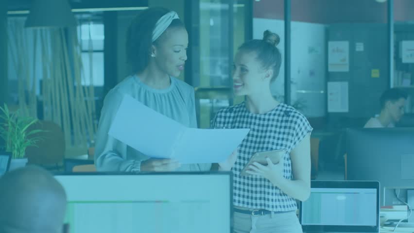 During marketing review lead holding plan and intern tapping tablet metrics showing social insights. Collaboration, technology, analytics, teamwork, innovation, modern, workspace - Powered by Shutterstock - Get 15% off with code: PIKWIZARD15