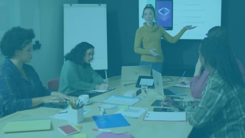 Presenter explaining slide content in tech meeting, code waveform overlay intensifying then fading. Collaboration, innovation, teamwork, corporate, modern, digital, professional