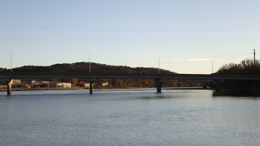 Bridge over Chippewa River in autumn sunset, Durand, Wisconsin - medium 4k shot