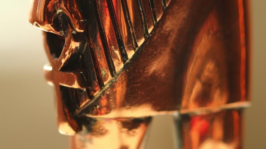 Close-up shot of a detailed horse head sculpture.