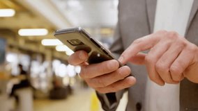 Businessman tapping smartphone, displaying avatar nodes and badges visualizing social media metrics. Technology, connectivity, networking, analytics, digital, communication, modern - Powered by Shutterstock - Get 15% off with code: PIKWIZARD15