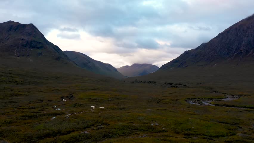 Bridge over Etive river in the highlands Scotland, with valley, mountains, roads and river Etive - Moody weather in Scottish highlands - Background ready image of beautiful landscape