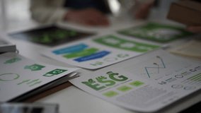 Corporate team in a business meeting discussing esg principles and sustainable recycling practices - Powered by Shutterstock - Get 15% off with code: PIKWIZARD15