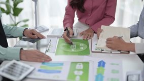 Businesspeople brainstorming ideas for green energy and environmental, social, and corporate governance - Powered by Shutterstock - Get 15% off with code: PIKWIZARD15