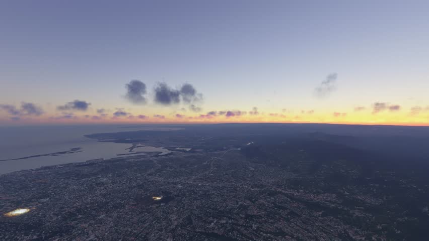 3D - Circular aerial drone shot at sunset of Kingston City. Jamaica