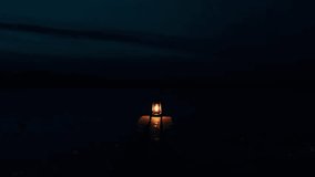 A burning kerosene lantern on a wooden bridge at night on the shore of a frozen lake. Silence on a frosty night.	 - Powered by Shutterstock - Get 15% off with code: PIKWIZARD15