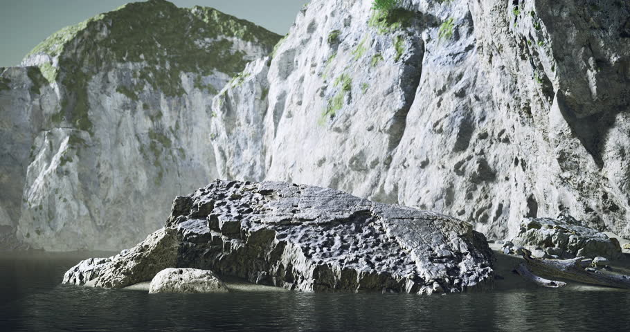 A tranquil landscape reveals a rough rock formation partially submerged in calm waters. Towering cliffs loom in the background, shrouded in the early morning mist and lush greenery.