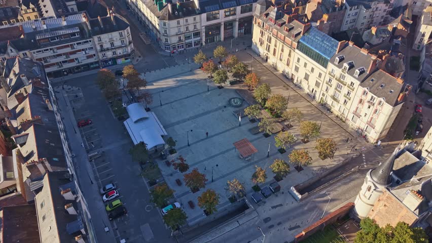Tilted drone fly over the urban Place Hoche square in the city center of Rennes, Brittany, France.