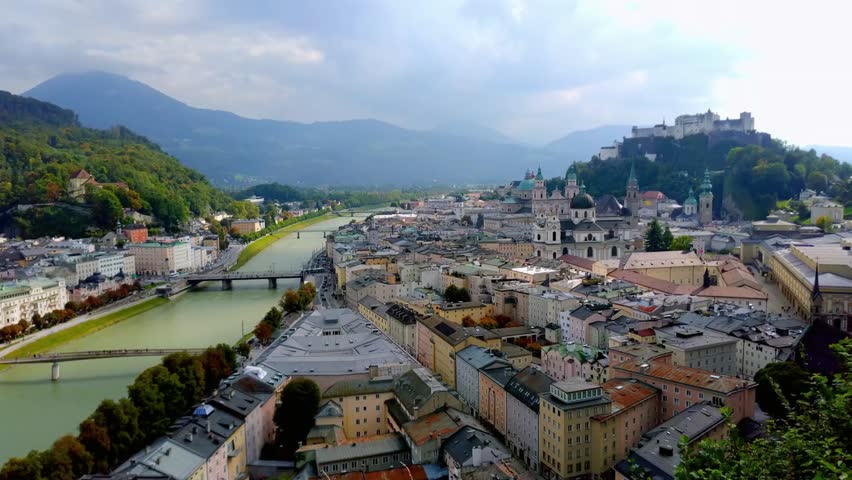 Aerial view of Salzburg Austria featuring the Salzach River and historic buildings