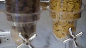 breakfast Grain dispensers filled with organic cereals in zero waste shop, clean eating - Powered by Shutterstock - Get 15% off with code: PIKWIZARD15