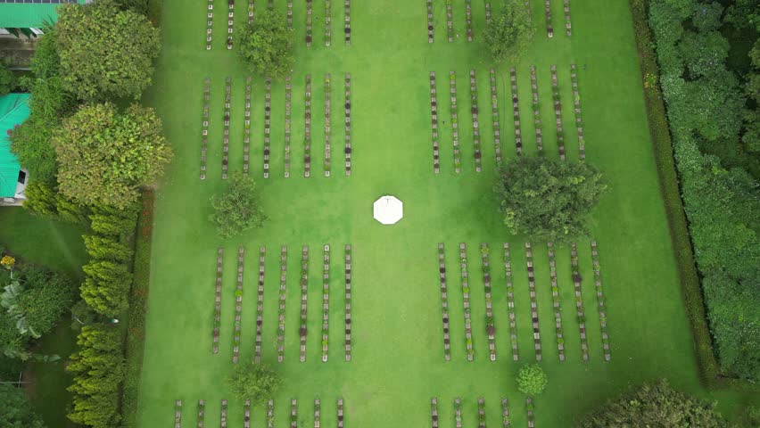The serene grounds of Chittagong War Cemetery, Bangladesh. A poignant tribute to the courage and sacrifice of Commonwealth forces during World War II.