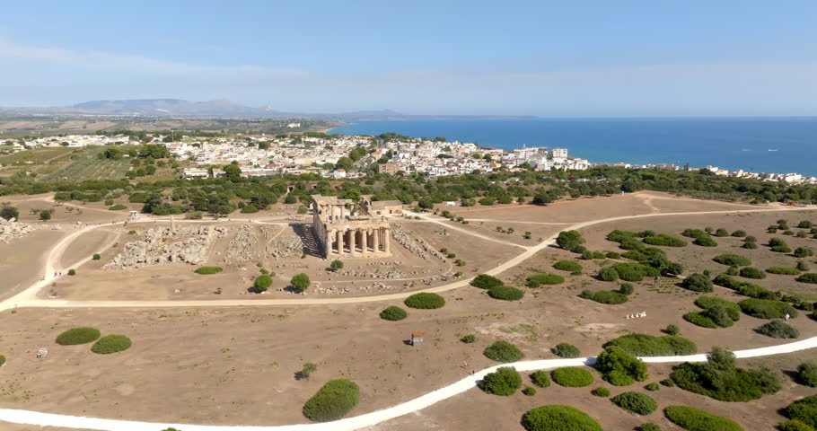 Aerial view of the Temple of Hera located at the archaeological site of Selinunte, in the province of Trapani, Sicily, Italy. The Mediterranean Sea and the modern town are in the background.