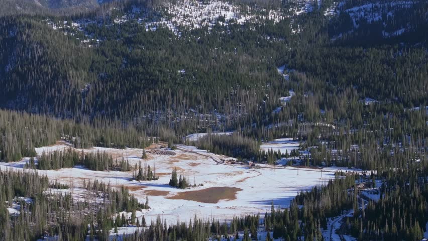 Snowy mountain highway, serene winter landscape at Wolf Creek Pass, Colorado