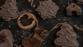 Festive cookies arranged on a dark surface, camera smoothly pans to showcase various shapes and textures of holiday treats. Christmas cookies concept - Powered by Shutterstock - Get 15% off with code: PIKWIZARD15