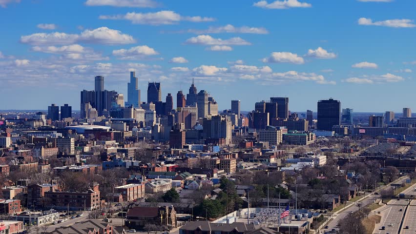 Timelapse Skyline View of Detroit Downtown With Blue Sky and Scattered Clouds