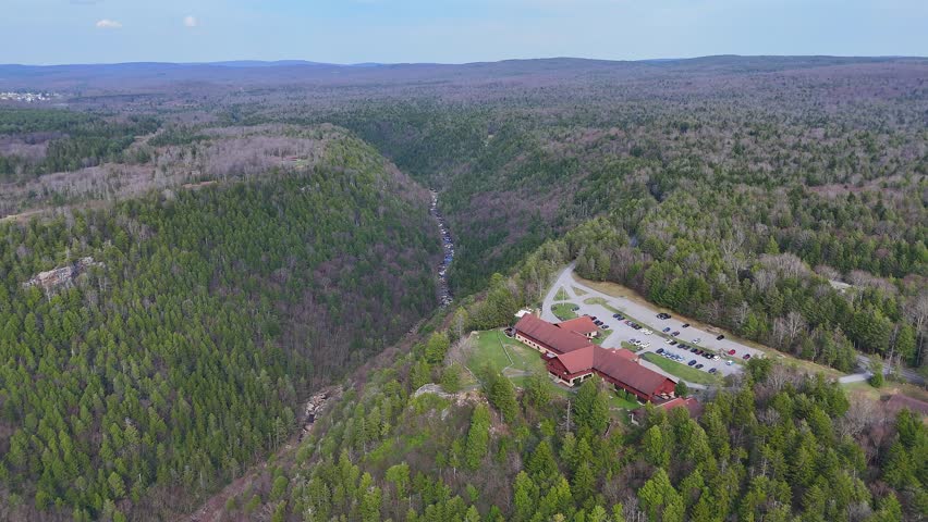 Aerial View of Lodge and Parking Lot Surrounded by Lush Forest in Blackwater Fall State Park