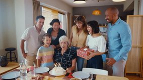 Storytelling image of a Family reunited at home for lunch on the holidays. Family members celebrating eating good food, sharing love and positive emotions. - Powered by Shutterstock - Get 15% off with code: PIKWIZARD15