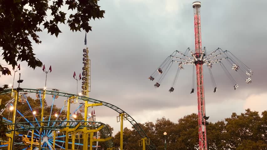 Amusement Rides and Attractions at Fair in Autumn"