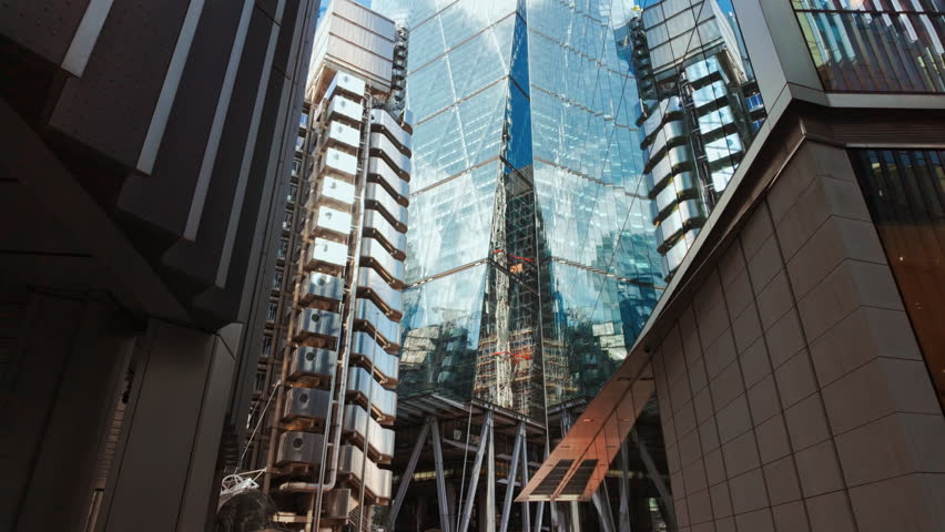 Bottom-up wide angle shot of important and futuristic skyscrapers in the financial center of London, England, UK
