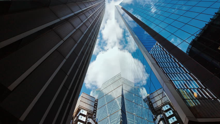 Bottom-up wide angle shot of important and futuristic skyscrapers in the financial center of London, England, UK
