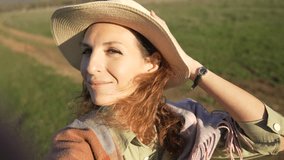 Happy woman, outdoor portrait, smiling enjoying beautiful nature Vertical video. - Powered by Shutterstock - Get 15% off with code: PIKWIZARD15