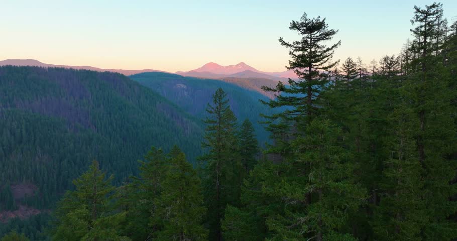 Aerial drone capture of warm sunset over Oregon’s Cascade peaks