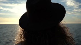 Sunset Silhouette Woman Watching Golden Ocean Horizon Vertical video. - Powered by Shutterstock - Get 15% off with code: PIKWIZARD15