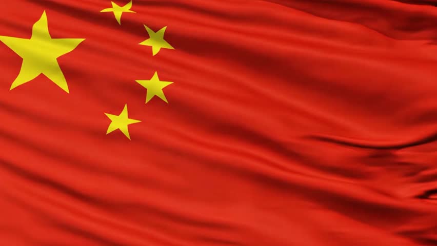 China national flag waving slowly in the wind, elegant red silk texture background, patriotic Chinese banner with golden stars, peaceful motion backdrop