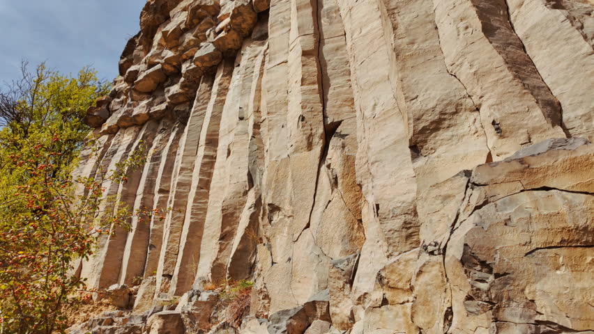 The Racos Basalt Columns, Romania, with towering basalt walls, columnar forms and rugged textures
