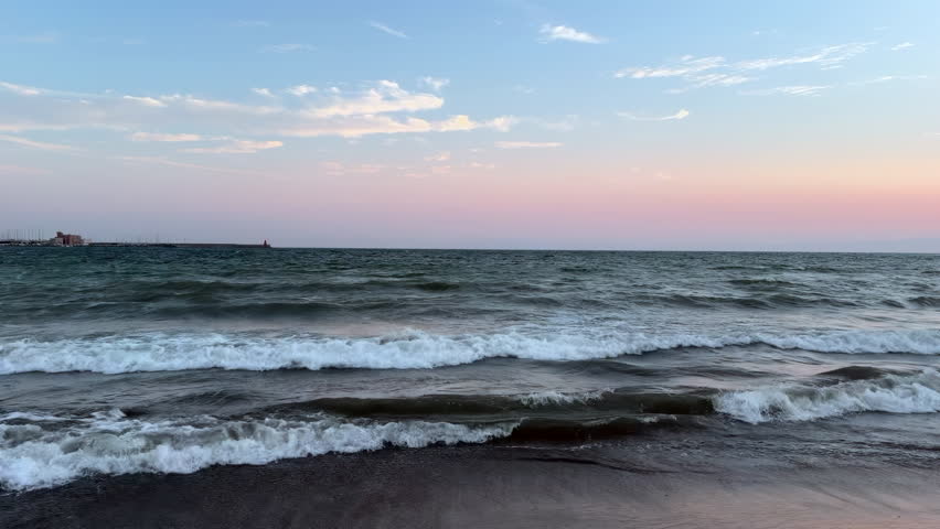 Sea Waves Rolling at Sunset on the Shore
