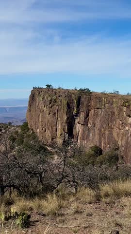 Dramatic Angular Cliff and Vivid Grasslands with Rolling Mountains (Big Bend National Park, Texas, USA)