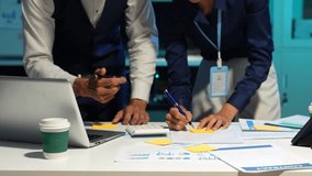 Business team analyzing financial data and planning projects in modern office. - Powered by Shutterstock - Get 15% off with code: PIKWIZARD15