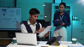 Businessmen team or financial data analysts working overtime with tablets and laptop computers and data graphs together. Plan to analyzing projects in the office. - Powered by Shutterstock - Get 15% off with code: PIKWIZARD15