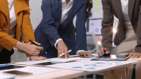 Collaboration among businesswoman analyze data charts and brainstorm ideas in office. Meeting to discuss strategy analysis and business planning. - Powered by Shutterstock - Get 15% off with code: PIKWIZARD15