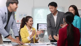 Diverse team of business professionals applauds colleague, celebrating coworker achievements and expressing support and appreciation in office. - Powered by Shutterstock - Get 15% off with code: PIKWIZARD15