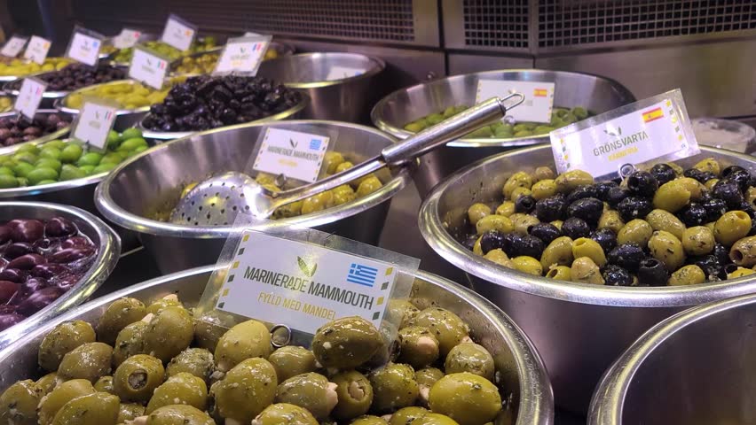 Pan Left Close Up of an Olive Bar