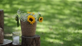 sunflowers and baby’s breath in a woven basket add charm to a garden setting - Powered by Shutterstock - Get 15% off with code: PIKWIZARD15