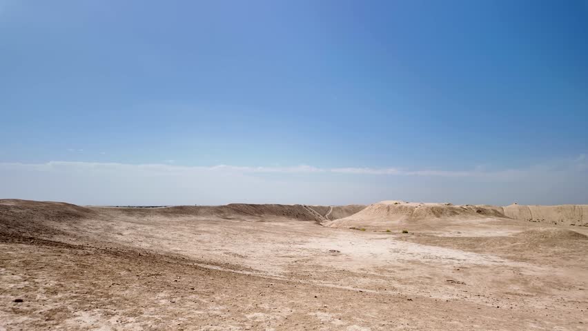 Dirt mounds cover the historic city of Erk Kala, in the desert of Ancient Merv, Turkmenistan