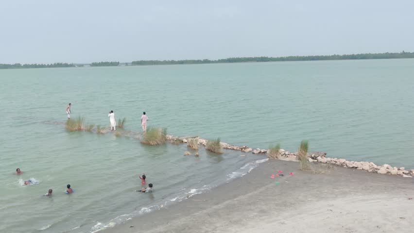 Sandy coastal landscape with a calm beach view.