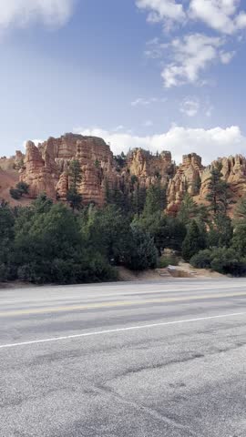 Scenic landscape views of Bryce Canyon National Park in Utah, USA. Majestic red rock formations, hoodoos, and desert cliffs captured in natural daylight.