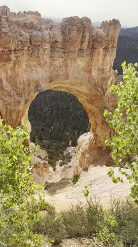 Scenic landscape views of Bryce Canyon National Park in Utah, USA. Majestic red rock formations, hoodoos, and desert cliffs captured in natural daylight.