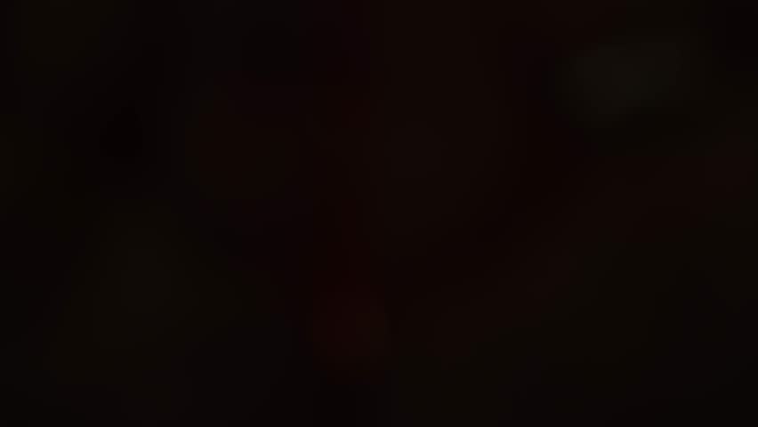 Darkness turns to light as eyes open, revealing a green screen world. Chroma key concept.