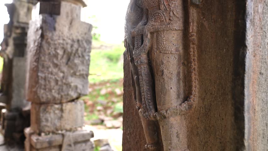 Carvings of human figures on walls of Temple in Mumbai, India. 16th century old, Bara khambi mandir.