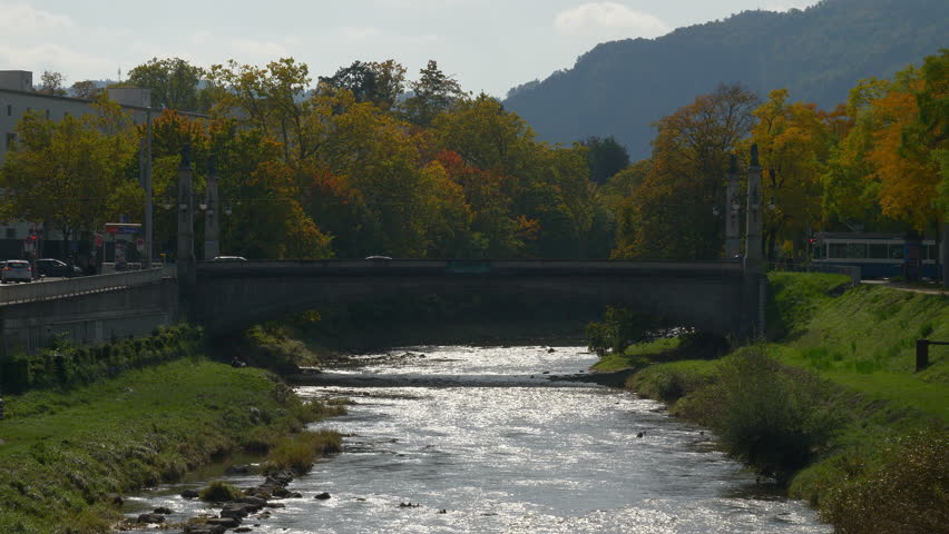 day time zurich city central riverside street bridge tram traffic panorama 4k switzerland