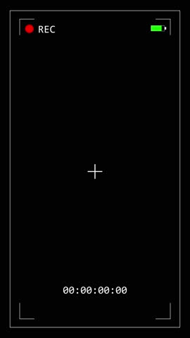 Vertical video of a camera recording interface overlay, showing digital display elements such as timer, REC icon, and focus frame on a black background.