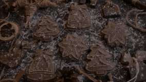 Festive cookies displayed on dark surface, camera zooms in to reveal intricate designs and textures of holiday treats. Christmas cookies concept  - Powered by Shutterstock - Get 15% off with code: PIKWIZARD15
