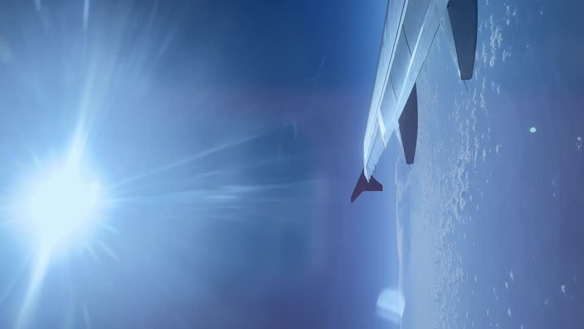 plane flying high above clouds, Aerial view from airplane window with clouds below, beautiful cloudscape, atmosphere layers visible, concept of travel, infinity, height nature and transcendence