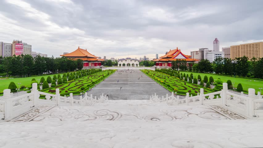 timelapse view at Chiang Kai Shek Memorial hall monument in Taipei City, Taiwan among sunset time. beautiful architecture building famous tourist landmark national monument of Taiwan